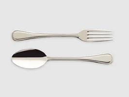 A stainless steel fork and spoon are placed next to each other on a plain light grey background.