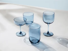 Various blue glasses from like. by Villeroy & Boch on a table.