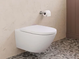 Des WC suspendus modernes avec une plaque de déclenchement dans une salle de bains aux murs structurés et au sol en pierre
