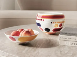 La Boule Miami on a table with a bowl of peaches