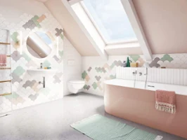 Un lavabo blanc O.novo dans une salle de bains avec un carrelage coloré derrière le plan de toilette
