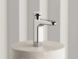 Single Villeroy & Boch Vea washbasin tap in chrome, with faceted design reminiscent of a timeless perfume flacon.