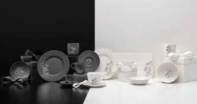 Colección completa Manufacture Mickey Colección completa Manufacture Mickey: vajilla de cerámica en diferentes tonos de blanco y negro sobre fondo blanco y negro.