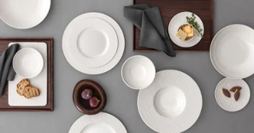 Manufacture ice collection picture Manufacture ice collection picture with some plate and bowls with bread on it stand on a grey background