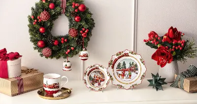 Festive Villeroy & Boch Annual Christmas Edition 2025 with decorated porcelain on a white sideboard.