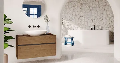 A white bathroom with an archway and a white Loop & Friends washbasin.