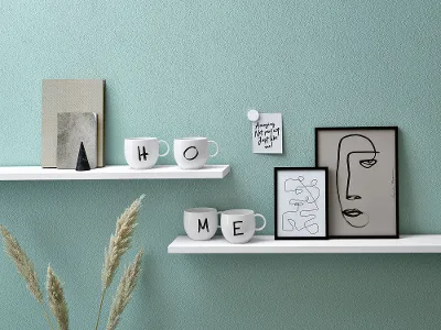 Minimalist shelves with decorative items, including mugs labelled "Home", a framed abstract facial image and a potted plant.	