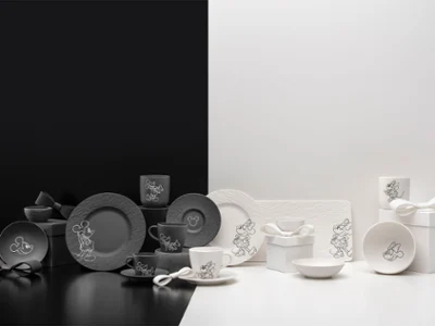 Complete Manufacture Mickey collection of various black and white ceramic tableware against a black and white background.
