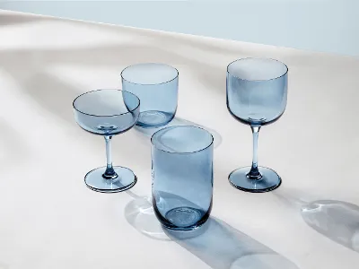 Various blue glasses from like. by Villeroy & Boch on a table.