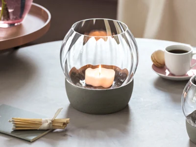 Close up shot of Rose Garden tealight candle holder on a table.