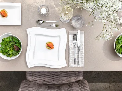 A table set with NewWave plates and cutlery from Villeroy & Boch.