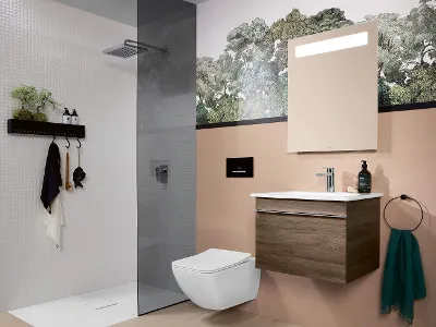 A bathroom with a Venticello toilet, vanity unit and Squaro Infinity shower.