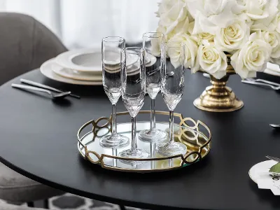 Octavie champagne glasses from Villeroy & Boch on a black tray.