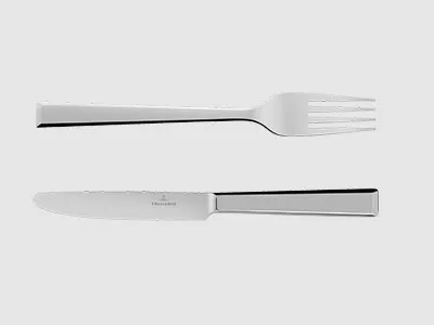 Eine Gabel und ein Messer aus Edelstahl sind parallel zueinander auf einem schlichten, hellen Hintergrund platziert.