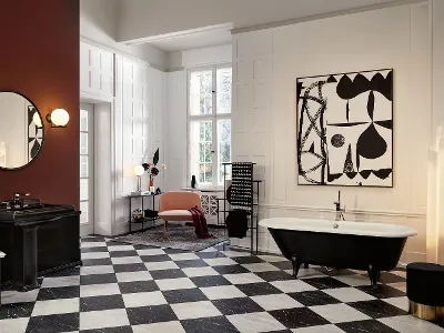 A bathroom with a black and white chequered floor and a black Hommage bath by Villeroy & Boch.