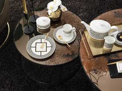 Collection Metrochic présentée sur une table basse dans une configuration quotidienne avec des assortiments de déserts.