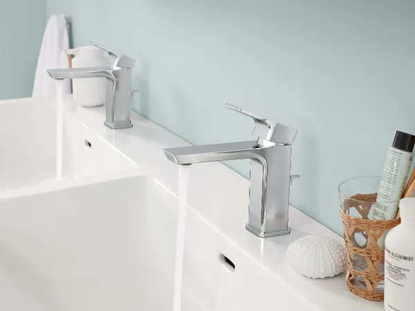 A Subway 3.0 double washbasin with silver-coloured taps in a bathroom with blue walls.