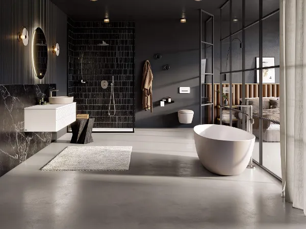 A modern bathroom with black walls and a white Antao bath by Villeroy & Boch.