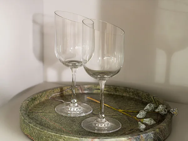 Two Villeroy & Boch NewMoon white wine glasses on a tray.