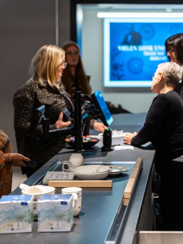 Payment at the check desk Payment at the check desk with people