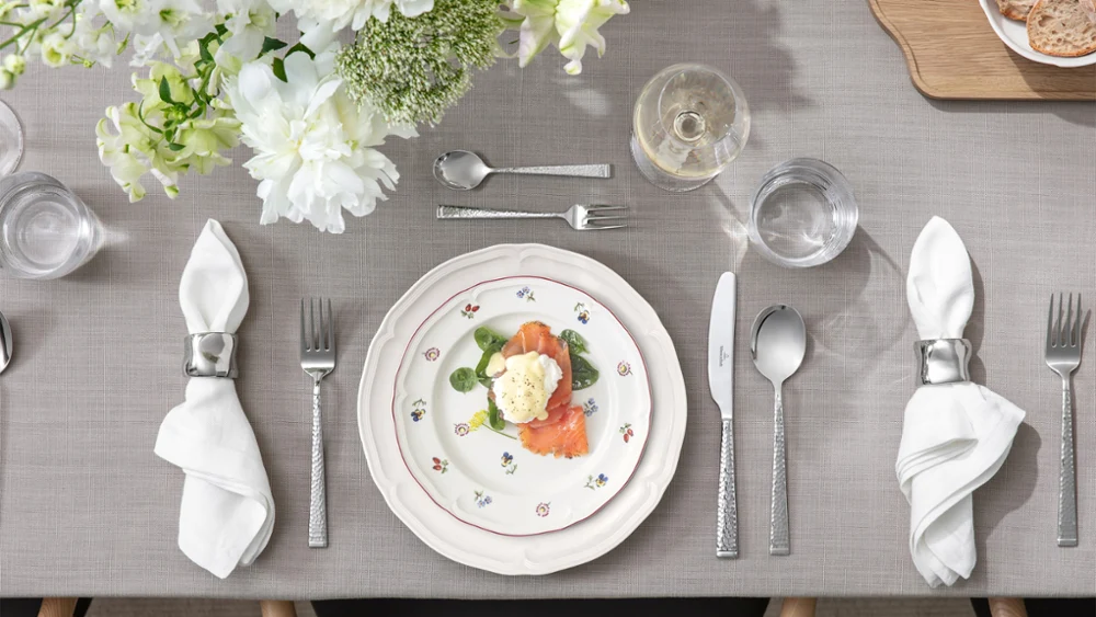 Close-up of Petite Fleur and Manoir plates styled together in a mix-and-match setting.