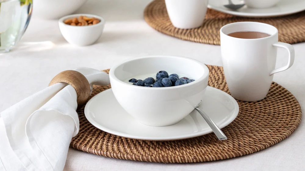Breakfast table with artesano bowl with yogurt and blueberries