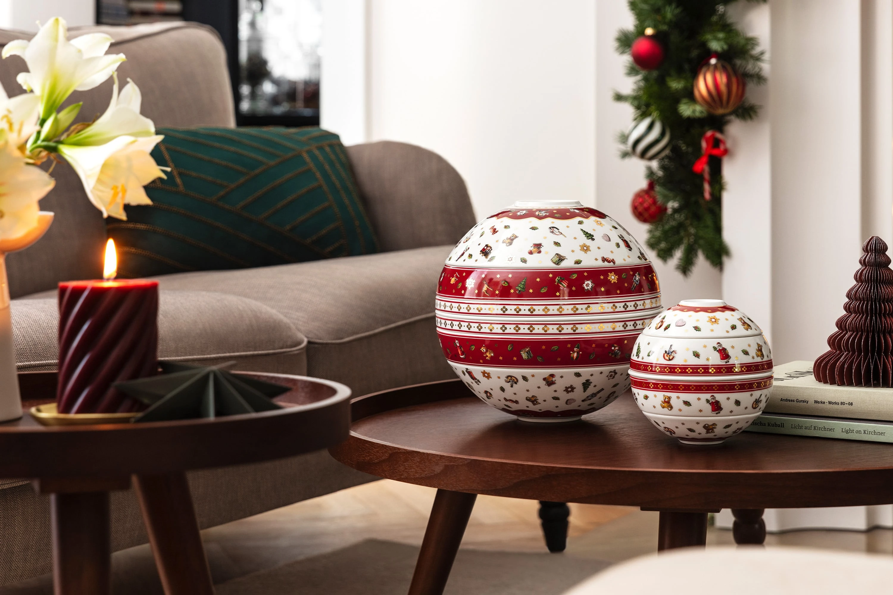 Toys Delight La Boule next to petite La Boule on coffee table Toys Delight La Boule next to petite La Boule used a home decor display in a festive living room.