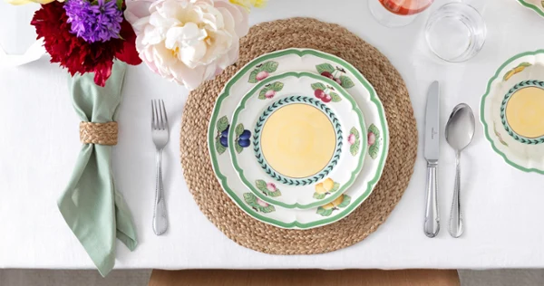 Aerial view of French Garden plate paired with Mademoiselle flatware.