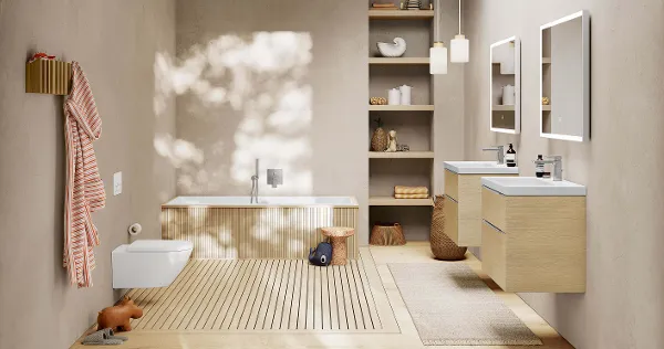 A bathroom with a wooden floor and elegant Subway 3.0 bathroom furniture in a wood look.