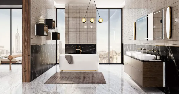 A freestanding bath from the Finion collection in a modern brightly lit bathroom.