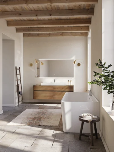 Collaro bathroom with wood beams, white tub, and oak vanity Warm Collaro bathroom with wooden ceiling beams, white bath, and vanity in natural oak tones. Soft daylight and neutral hues create a cozy country-style retreat.