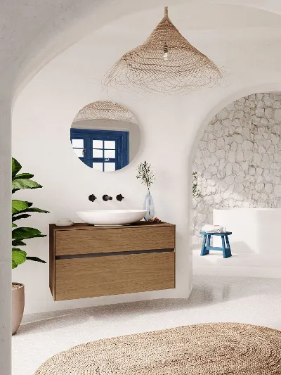 A white bathroom with an archway and a white Loop & Friends washbasin.