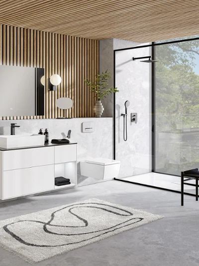A modern bathroom with modern wooden ceilings and a white Memento 2.0 washbasin and toilet.