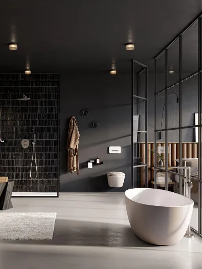 A modern bathroom with black walls and a white Antao bath by Villeroy & Boch.