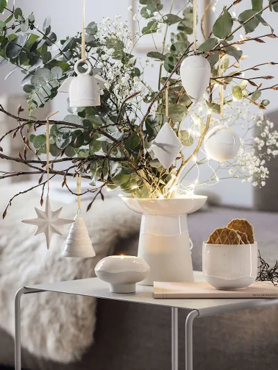 A living room decorated with Villeroy & Boch Winter Glow ornaments.