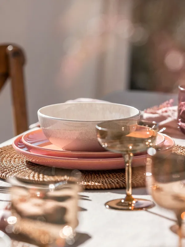 A table set with plates and cutlery from Perlemor and Piemont by Villeroy & Boch.