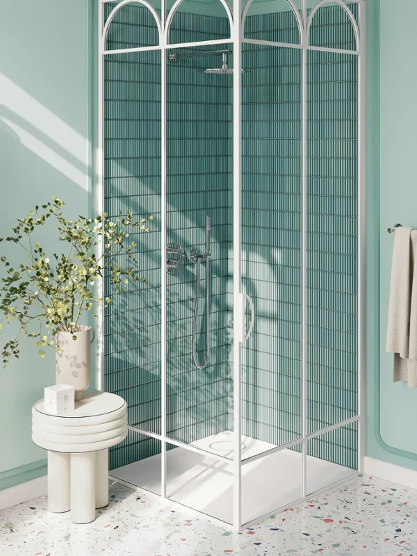Villeroy & Boch Ecora shower tray in a sage-green shower with chrome fittings.