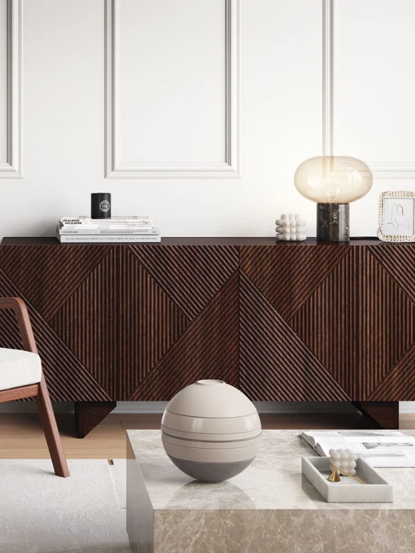 La Boule Beige on a coffee table A Villeroy & Boch beige La Boule on a coffee table in a white living room with dark wooden furniture.