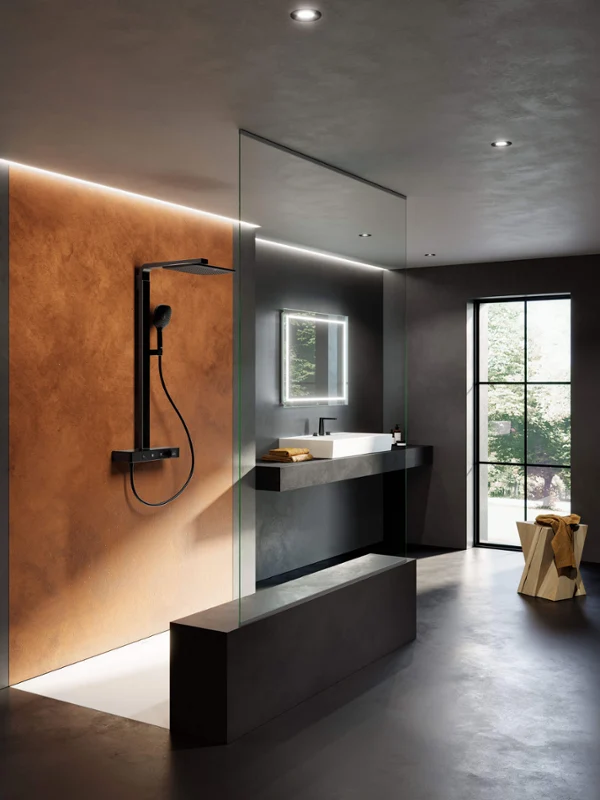 Infinity Showers shower system with a shower tray Modern bathroom in a minimalist design with a glazed shower, a wall-mounted black shower head, a large mirror with lighting, a washbasin with a dark countertop and a stool next to a window.
