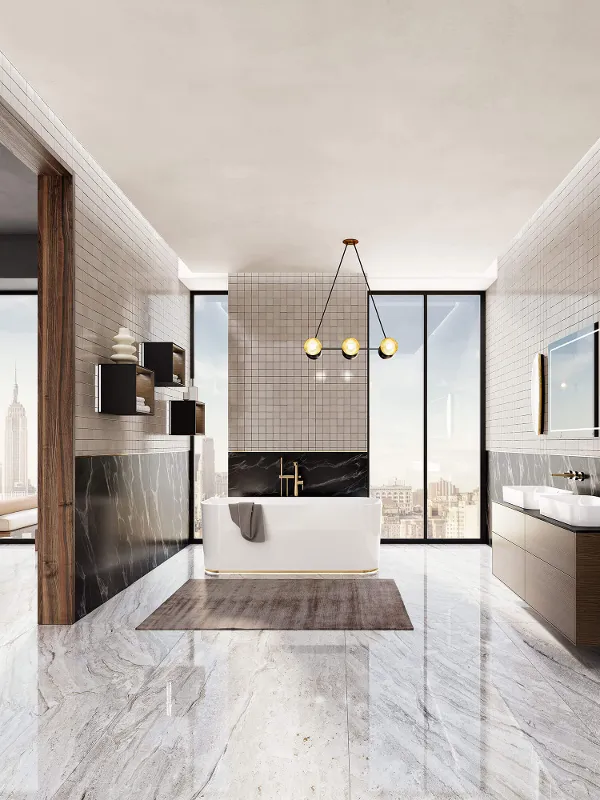 A freestanding bath from the Finion collection in a modern brightly lit bathroom.