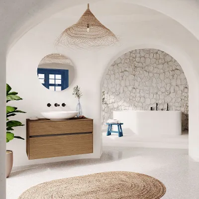 A white bathroom with an archway and a white Loop & Friends washbasin.