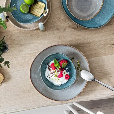 Lave plates and bowls on a wooden table