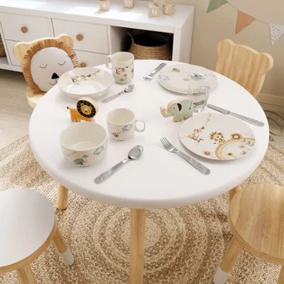 Boho kids crockery on a small table in the children's room A table setting in a children's room with Boho Kids crockery, cutlery and glasses in an animal theme in pastel colours.