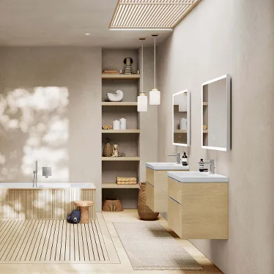 A bathroom with a wooden floor and elegant Subway 3.0 bathroom furniture in a wood look.