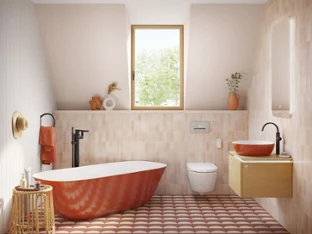 A modern bathroom with a red freestanding bath, a wooden washstand with a black washbasin, a wall-mounted toilet
