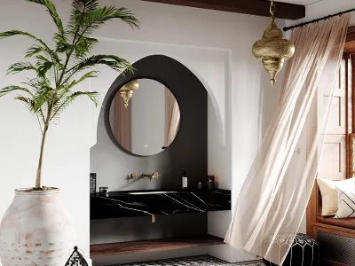 More to See Spiegel in einem Badezimmer im Marrakesch-Look Modernes Villeroy & Boch Badezimmer mit großem More to See Spiegel, Loop & Friends Waschtisch, geometrischem Fliesenboden und goldenen Akzenten und Grünpflanzen.