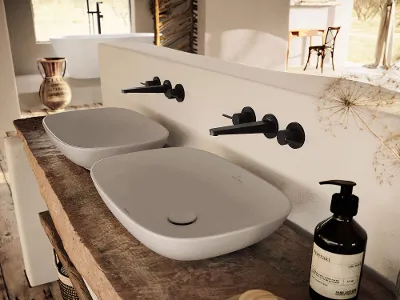 Loop & Friends Waschbecken mit schwarzen Conum Armaturen Modernes Badezimmer-Interieur mit zwei ovalen Loop & Friends Waschbecken auf einer rustikalen Holzarbeitsplatte, mit mattschwarzen Conum Wasserhähnen