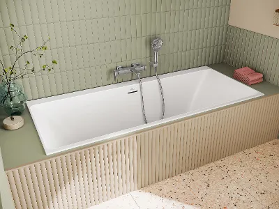Subway 3.0 Badewannenarmatur mit Handbrause Eine Subway 3.0 Badewannenarmatur an einer Badewanne mit Handbrause vor einer grün gefliesten Wand