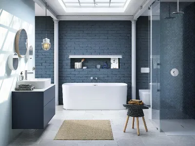 Freistehende weiße Badewanne, Waschbecken, verglaste Dusche in modernem, blauen Bad Modernes Badezimmer mit blauer Ziegelwand, weißer freistehender Badewanne, verglaster Dusche, Waschtisch mit runden Spiegeln und einem kleinen Hocker. Sonnenlicht fällt durch ein Oberlicht ein.