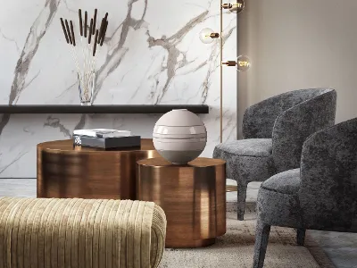 La Boule Pure Beige auf einem Wohnzimmertisch Ein Wohnzimmertisch mit eine beigen La Boule von Villeroy & Boch darauf und Sesseln.